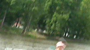 Nude woman outside showing off her body