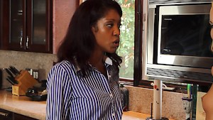 Black pussy wearing a black rubber dick