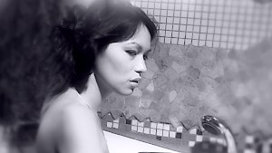 Lovely Lady Mai brings her Asian pussy to a wet climax